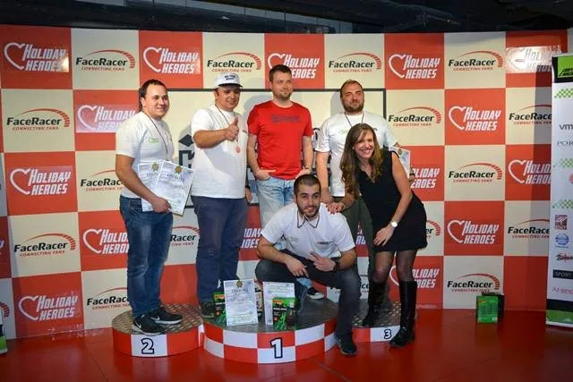 IBS team on the podium at the Holiday Heroes charity go-kart tournament